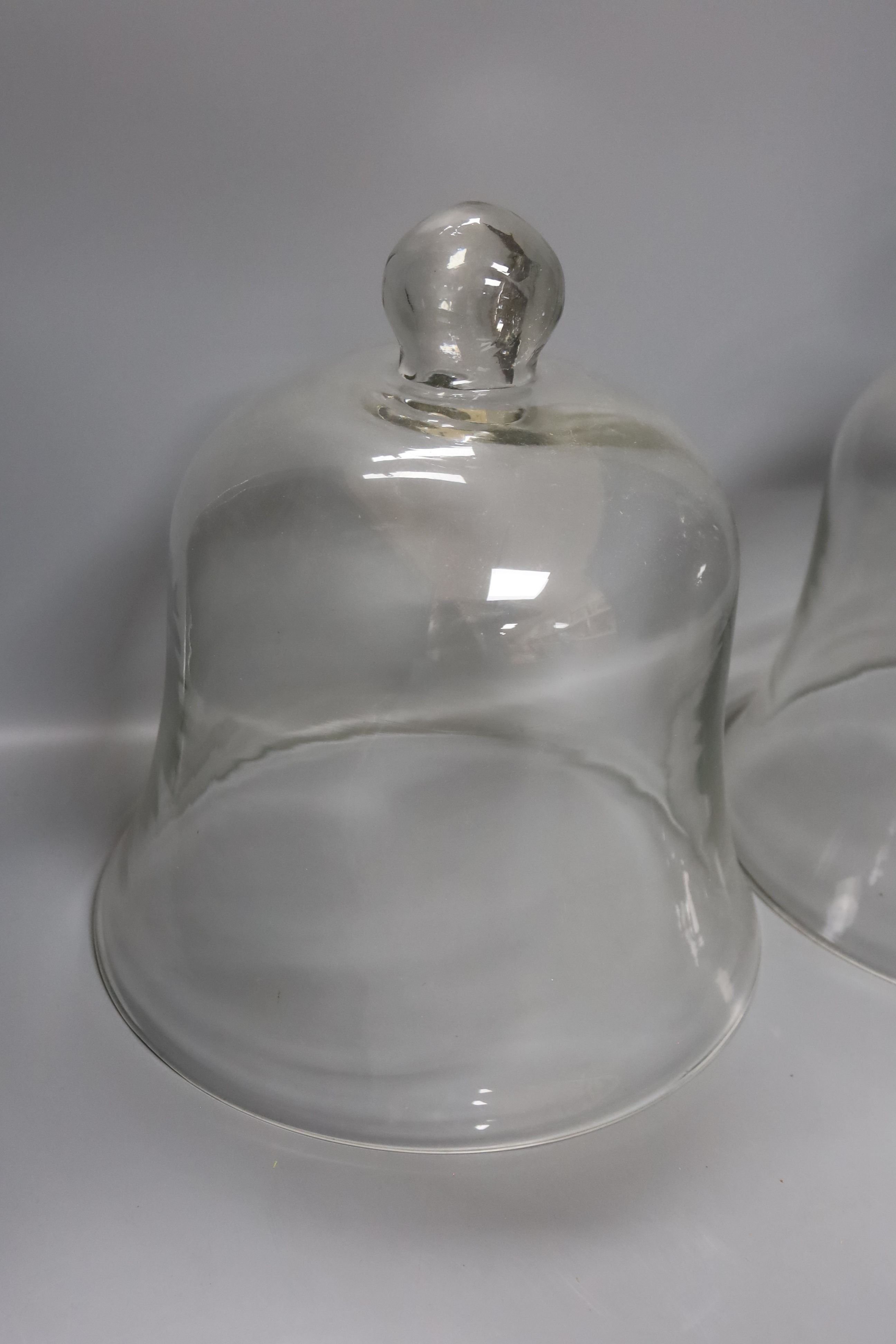 A pair of 19th century glass cloches 29cm